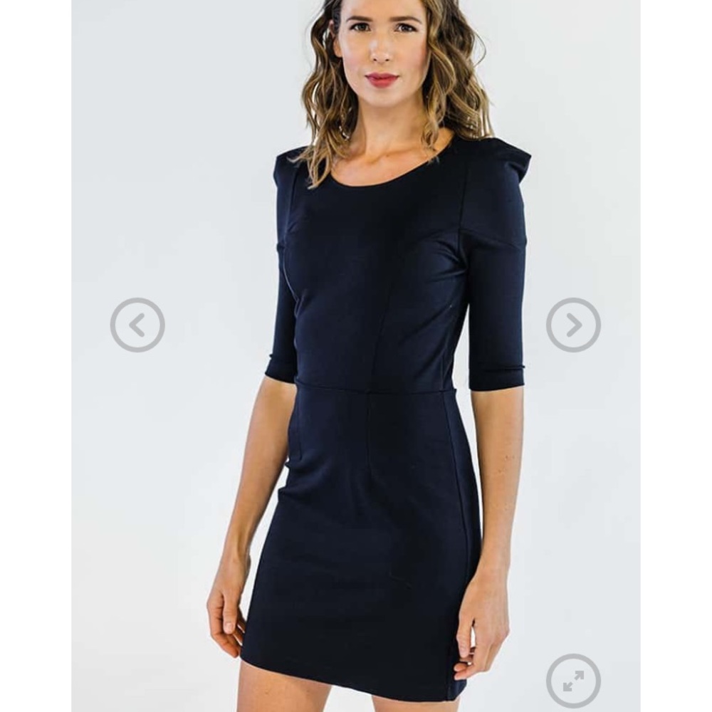 Elle Lauri pointed shoulder black dress